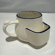Vintage ceramic mug with an