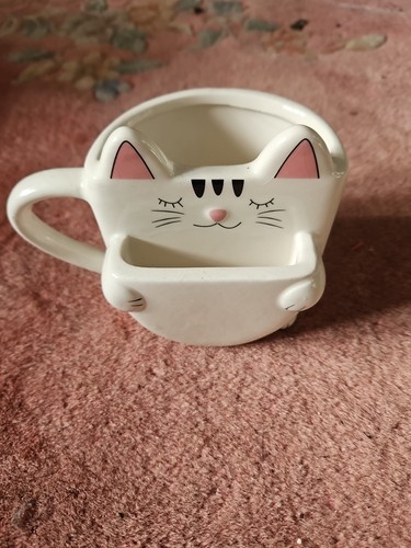 Cat design mug with - with, biscuit